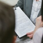 A Person Holding a Contract Document